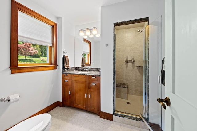 72 Vine St, South Berwick, ME 03908 - bathroom featuring a stall shower, vanity, toilet, tile patterned flooring, and baseboards