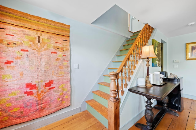 72 Vine St, South Berwick, ME 03908 - stairs with wood-type flooring and baseboards