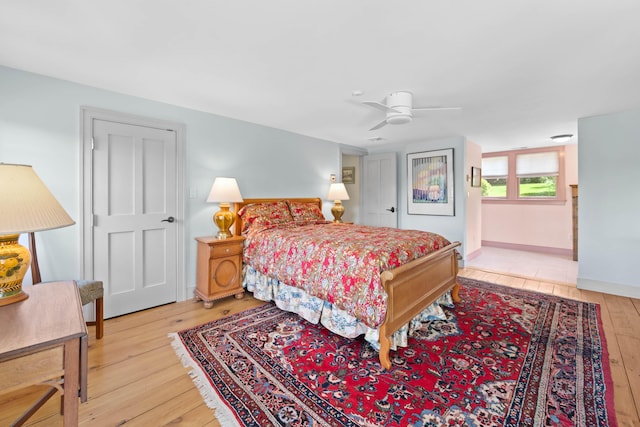 72 Vine St, South Berwick, ME 03908 - bedroom with hardwood / wood-style flooring, a ceiling fan, and baseboards