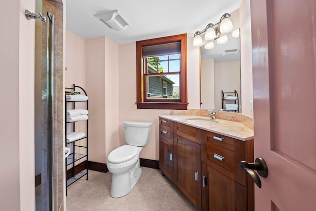 72 Vine St, South Berwick, ME 03908 - full bath with toilet, vanity, tile patterned floors, and baseboards