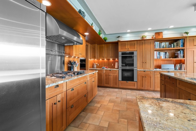 72 Vine St, South Berwick, ME 03908 - kitchen with appliances with stainless steel finishes, wall chimney exhaust hood, stone finish flooring, recessed lighting, and light stone countertops