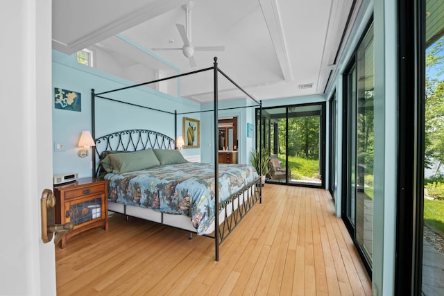 72 Vine St, South Berwick, ME 03908 - bedroom with multiple windows, wood finished floors, floor to ceiling windows, and access to outside