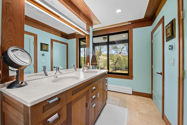 72 Vine St, South Berwick, ME 03908 - bathroom with a baseboard radiator, double vanity, baseboards, tile patterned flooring, and recessed lighting