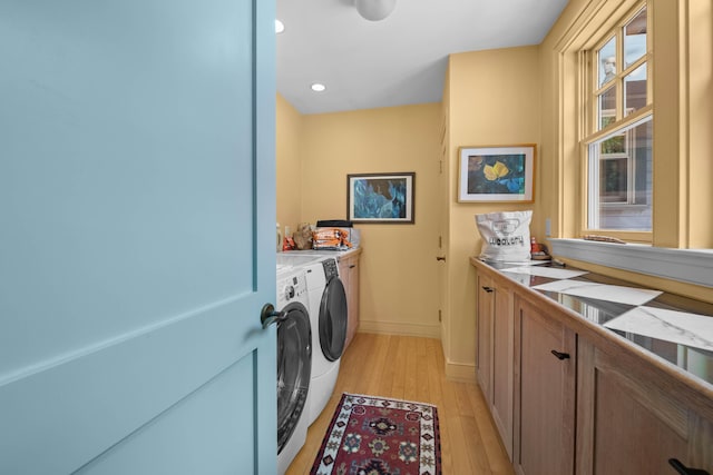 72 Vine St, South Berwick, ME 03908 - washroom with separate washer and dryer, baseboards, light wood-style flooring, recessed lighting, and cabinet space