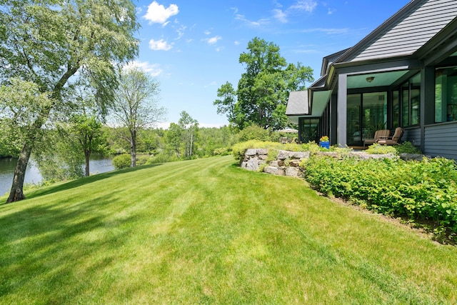 72 Vine St, South Berwick, ME 03908 - view of grassy yard with a water view and a sunroom
