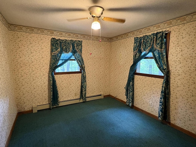 16 Evergreen Estates Rd, Nobleboro, ME 04555 - empty room with healthy amount of natural light, a baseboard heating unit, carpet, a textured ceiling, and wallpapered walls