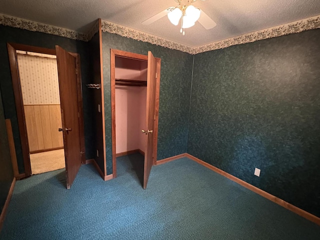 16 Evergreen Estates Rd, Nobleboro, ME 04555 - unfurnished bedroom with carpet, a textured ceiling, a ceiling fan, and a closet