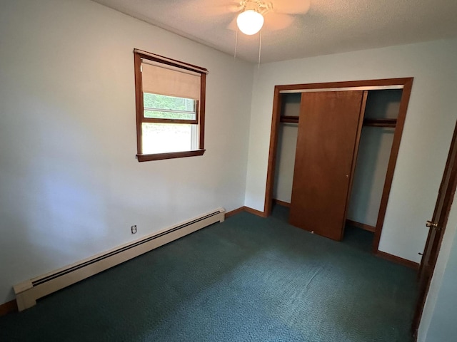 16 Evergreen Estates Rd, Nobleboro, ME 04555 - unfurnished bedroom featuring baseboard heating, carpet flooring, a closet, and a ceiling fan