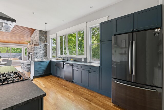 217 Ocean Ave, Portland, ME 04103 - kitchen with stainless steel appliances, a sink, and healthy amount of natural light