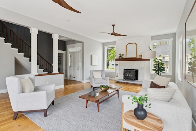 217 Ocean Ave, Portland, ME 04103 - living room featuring ceiling fan, wood finished floors, baseboards, and stairway