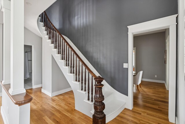 217 Ocean Ave, Portland, ME 04103 - stairs featuring wood finished floors and baseboards