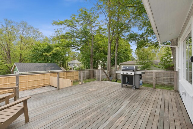 217 Ocean Ave, Portland, ME 04103 - wooden terrace with grilling area and a fenced backyard