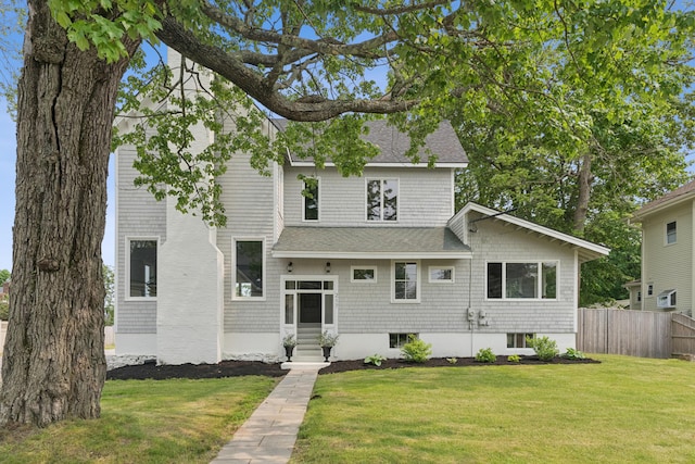 217 Ocean Ave, Portland, ME 04103 - view of front of house with entry steps and a shingled roof