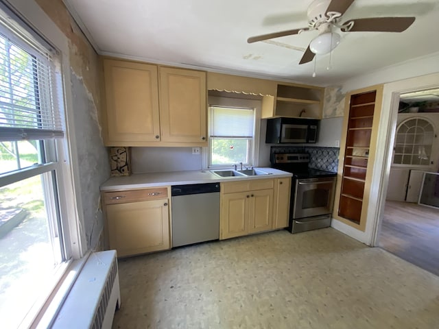 147 Spring St, Westbrook, ME 04092 - kitchen with stainless steel appliances, a sink, cream cabinets, ceiling fan, and light countertops