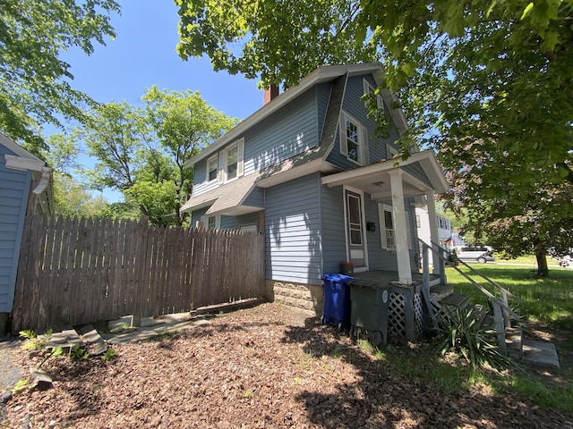 147 Spring St, Westbrook, ME 04092 - view of property exterior featuring a chimney
