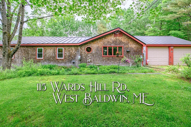 115 Wards Hill Rd, Baldwin, ME 04091 - view of front of home featuring a front yard, a metal roof, and a garage