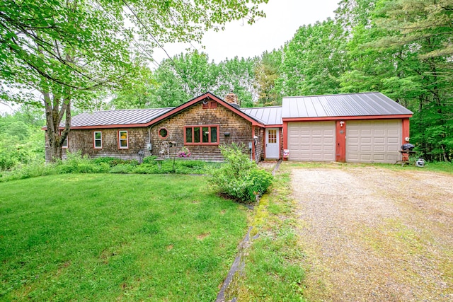 115 Wards Hill Rd, Baldwin, ME 04091 - view of front of property with a chimney, dirt driveway, a standing seam roof, a metal roof, and an attached garage