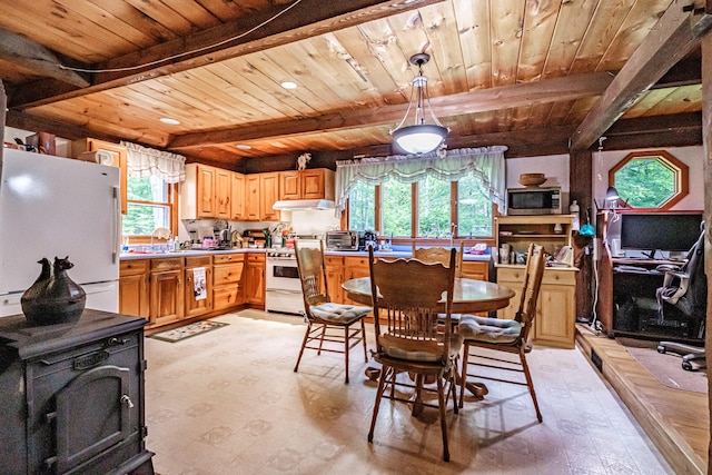 115 Wards Hill Rd, Baldwin, ME 04091 - dining space featuring a wooden ceiling with exposed beams, healthy amount of natural light, light floors, and a wood stove