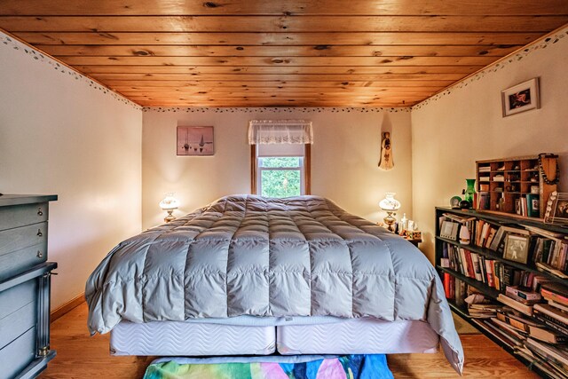 115 Wards Hill Rd, Baldwin, ME 04091 - bedroom with wooden ceiling and wood finished floors