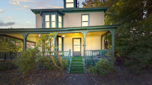 143 Union Ave, Old Orchard Beach, ME 04064 - view of front of home featuring covered porch