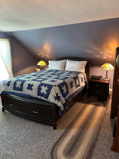 48 Allen St, Bangor, ME 04401 - bedroom featuring carpet, vaulted ceiling, and a baseboard radiator