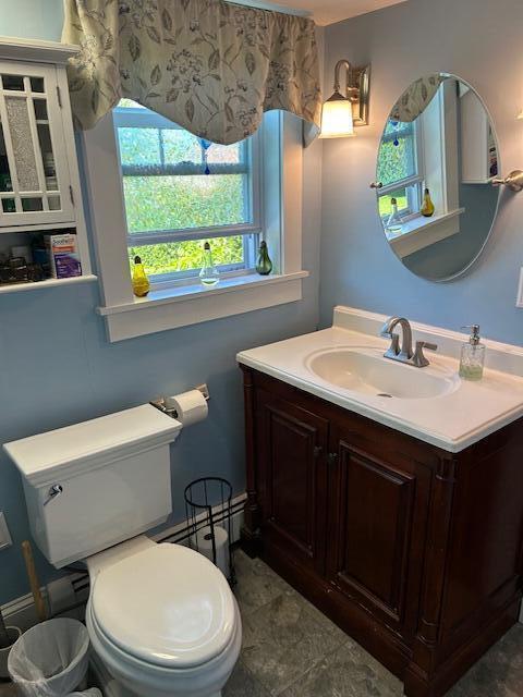 48 Allen St, Bangor, ME 04401 - bathroom with vanity and toilet