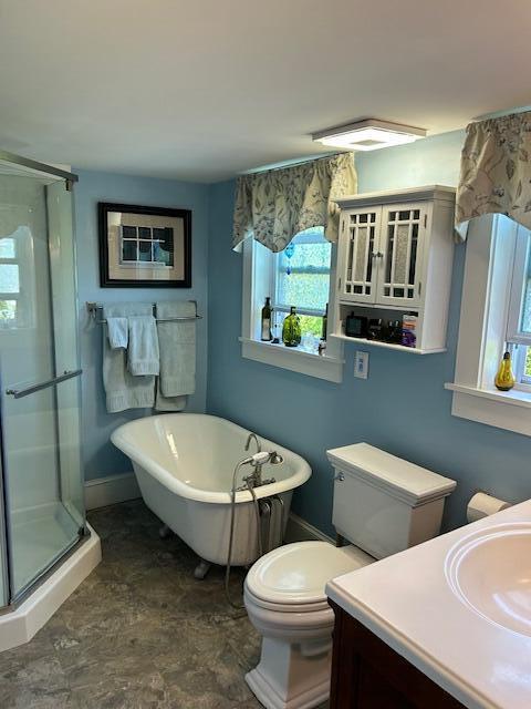 48 Allen St, Bangor, ME 04401 - full bath with plenty of natural light, vanity, and a stall shower