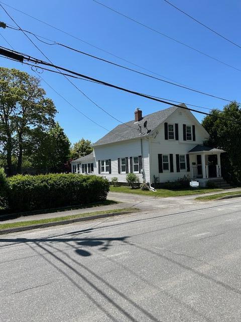 48 Allen St, Bangor, ME 04401 - view of front of home with a chimney