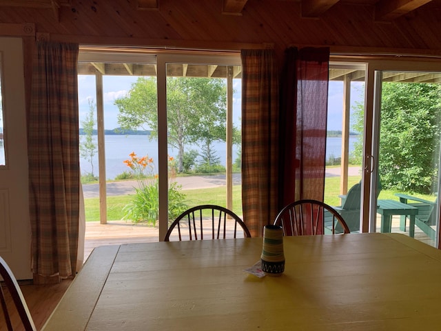 15 Snyder Rd, Eastport, ME 04631 - unfurnished dining area featuring a water view and wooden ceiling