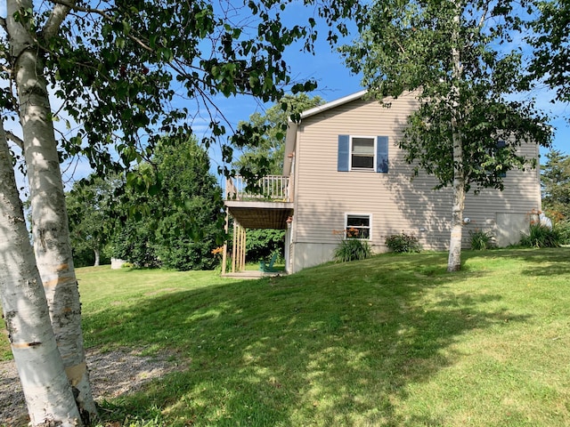 15 Snyder Rd, Eastport, ME 04631 - view of property exterior featuring a yard and a wooden deck
