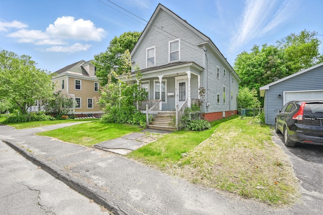 4 Heath St, Waterville, ME 04901 - view of front of house featuring a porch and a front yard