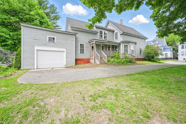 4 Heath St, Waterville, ME 04901 - view of front facade with a porch, a chimney, asphalt driveway, a front yard, and an attached garage
