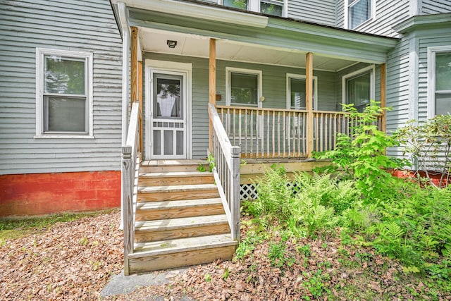4 Heath St, Waterville, ME 04901 - doorway to property with a porch