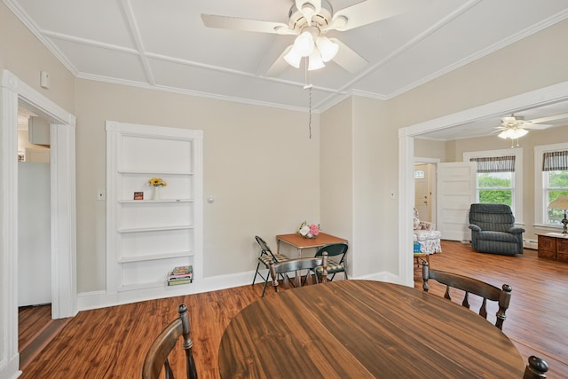 4 Heath St, Waterville, ME 04901 - dining area with ceiling fan, wood finished floors, built in shelves, baseboards, and ornamental molding