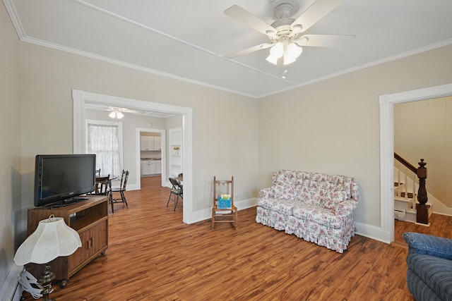 4 Heath St, Waterville, ME 04901 - living area with a ceiling fan, wood finished floors, ornamental molding, and baseboards