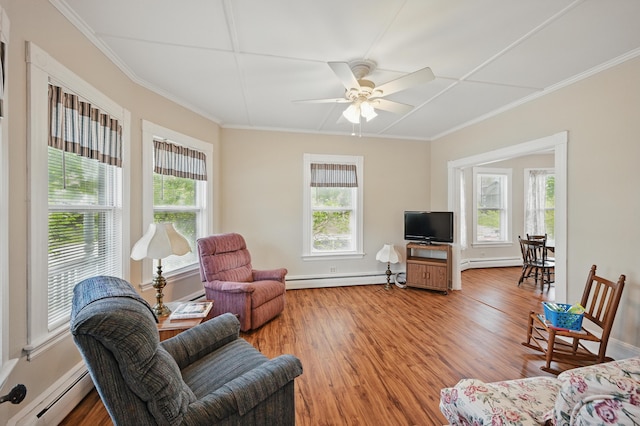 4 Heath St, Waterville, ME 04901 - living room featuring a baseboard radiator, baseboard heating, plenty of natural light, and ornamental molding