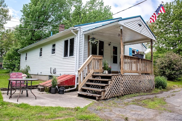 130 Davis Rd, Fairfield, ME 04937 - view of front facade featuring a patio area