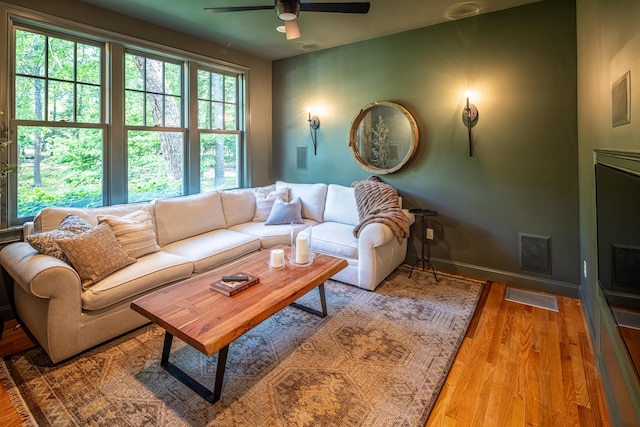 20 Doe Dr, Eliot, ME 03903 - living area with a ceiling fan, wood finished floors, and baseboards