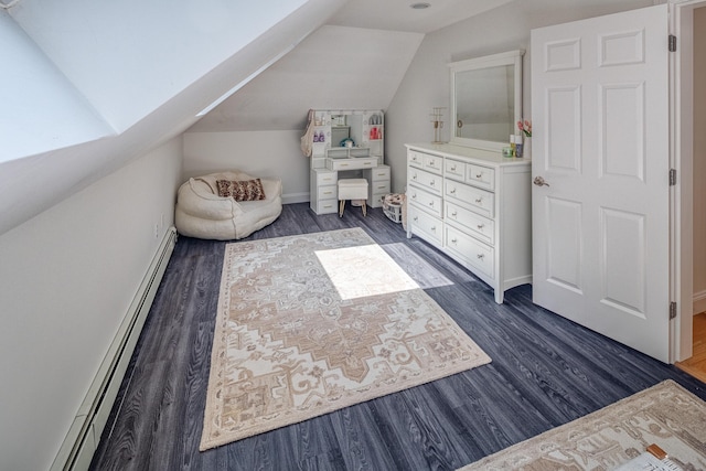 20 Doe Dr, Eliot, ME 03903 - bedroom featuring dark wood-style flooring, lofted ceiling, a baseboard heating unit, and baseboards