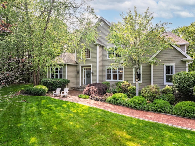 20 Doe Dr, Eliot, ME 03903 - view of front facade featuring a front lawn and a shingled roof