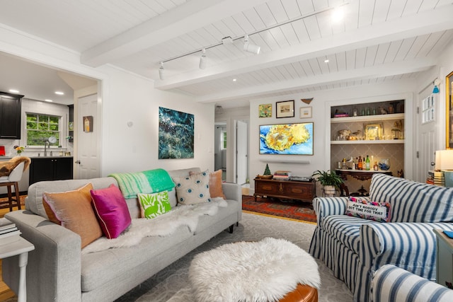 83 Brixham Rd, York, ME 03909 - living room featuring track lighting, wood ceiling with exposed beams, and recessed lighting