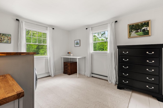 83 Brixham Rd, York, ME 03909 - bedroom with baseboard heating, multiple windows, and light colored carpet