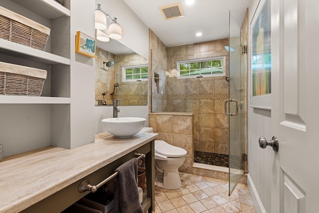 83 Brixham Rd, York, ME 03909 - full bathroom featuring toilet, a shower stall, vanity, and tile patterned flooring