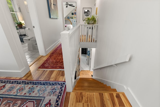83 Brixham Rd, York, ME 03909 - stairway featuring wood finished floors, baseboards, and ceiling fan