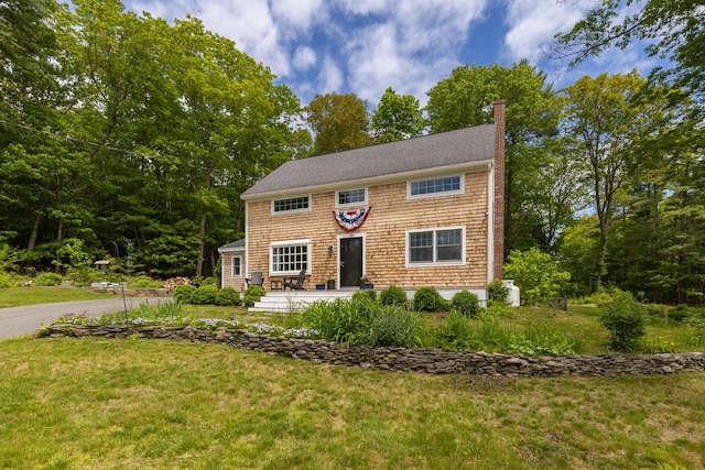 83 Brixham Rd, York, ME 03909 - shingle-style home with a front yard and a chimney