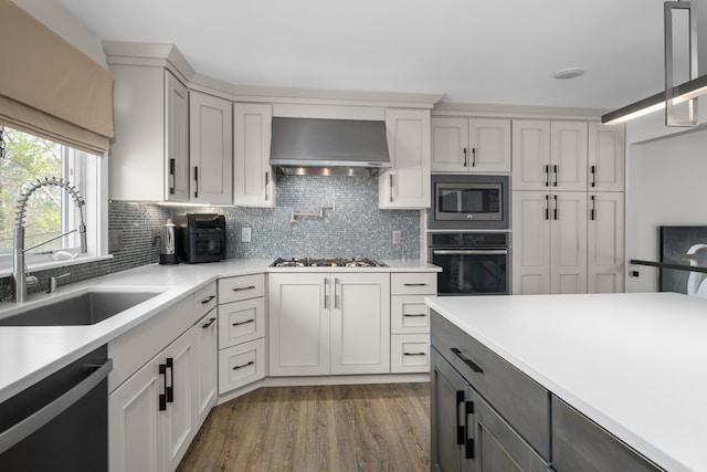 36 Bayberry Ave, Kennebunk, ME 04043 - kitchen featuring oven, ventilation hood, dishwashing machine, a sink, and gas cooktop
