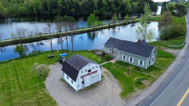 590 Main St, East Machias, ME 04630 - view of subject property with a nearby body of water and a heavily wooded area