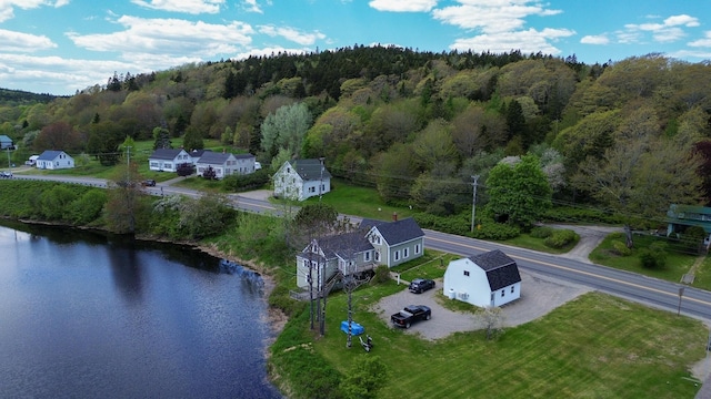 590 Main St, East Machias, ME 04630 - aerial view of property and surrounding area with a forest and a nearby body of water
