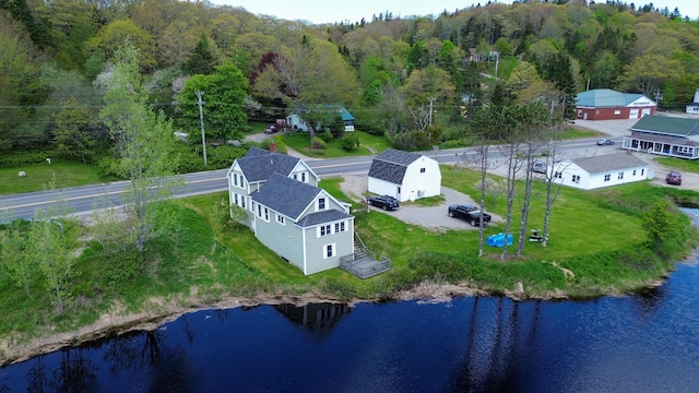 590 Main St, East Machias, ME 04630 - aerial view of property and surrounding area featuring a large body of water and a forest
