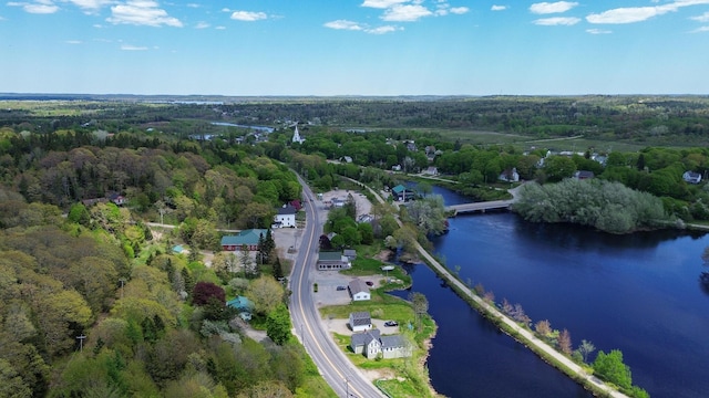 590 Main St, East Machias, ME 04630 - aerial overview of property's location featuring a nearby body of water and a heavily wooded area